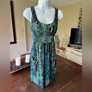 Diane Von Furstenberg size 6 sleeveless (fits like a 4-in my opinion). 100% silk